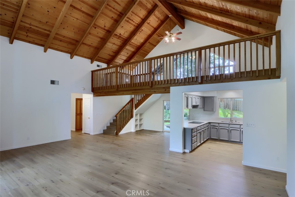 7174 Hites Cove Road Mariposa, CA 95338 - Photo 11 of 62 a view of an empty room with wooden floor