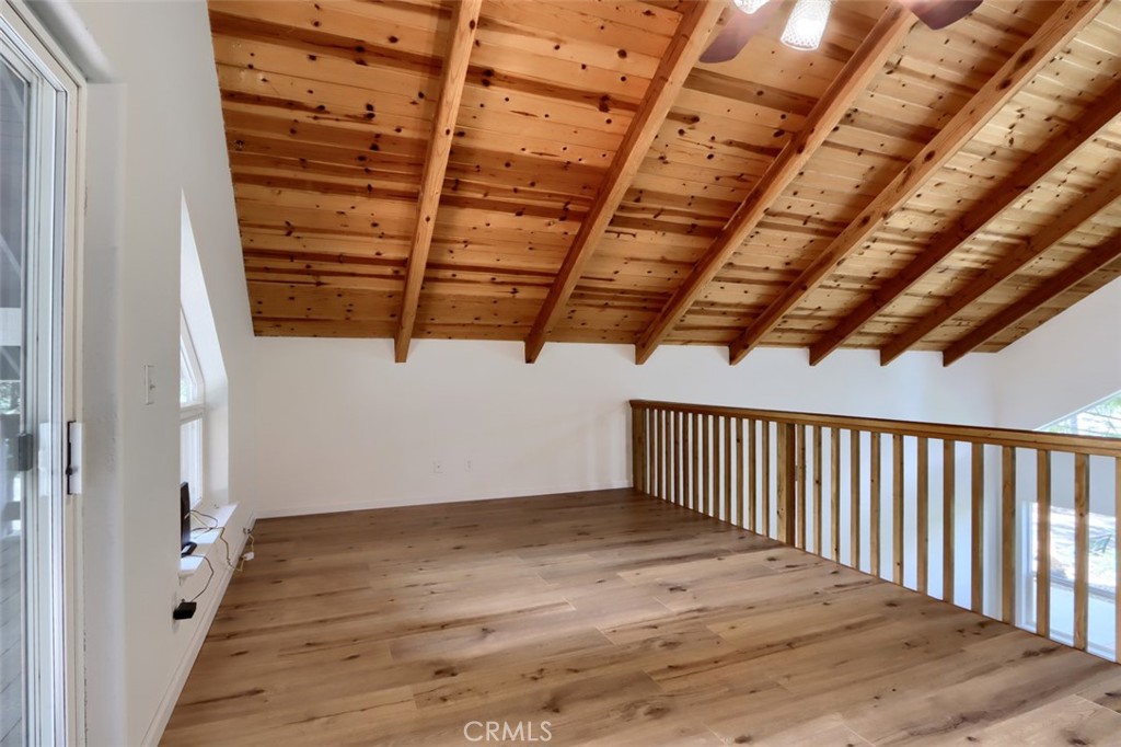7174 Hites Cove Road Mariposa, CA 95338 - Photo 14 of 62 a view of a hallway with wooden floor