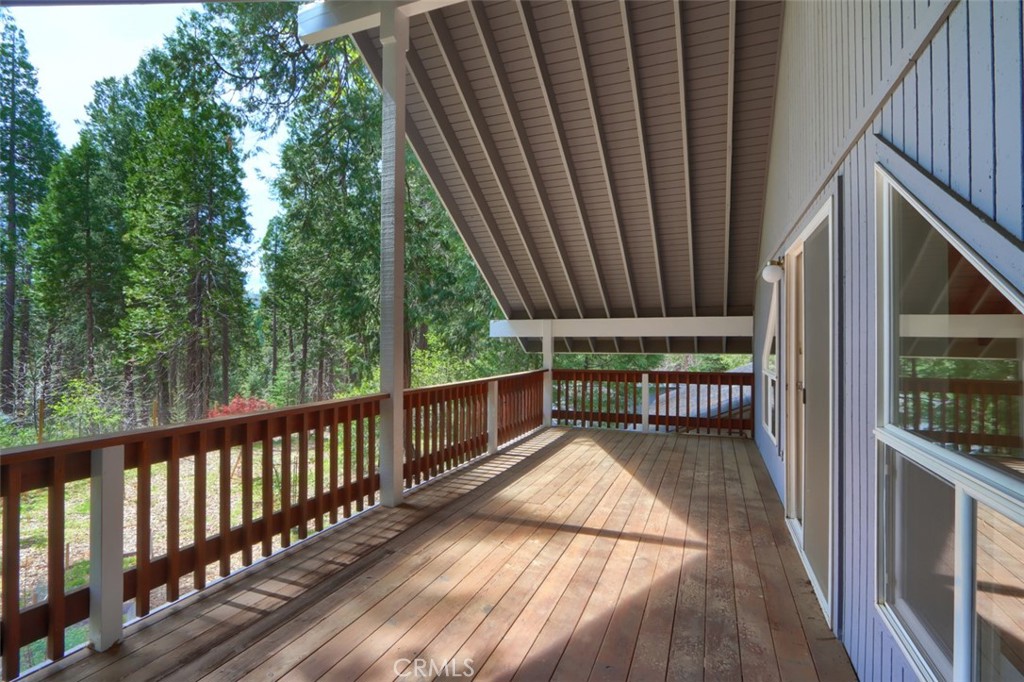 7174 Hites Cove Road Mariposa, CA 95338 - Photo 17 of 62 a view of balcony with wooden floor