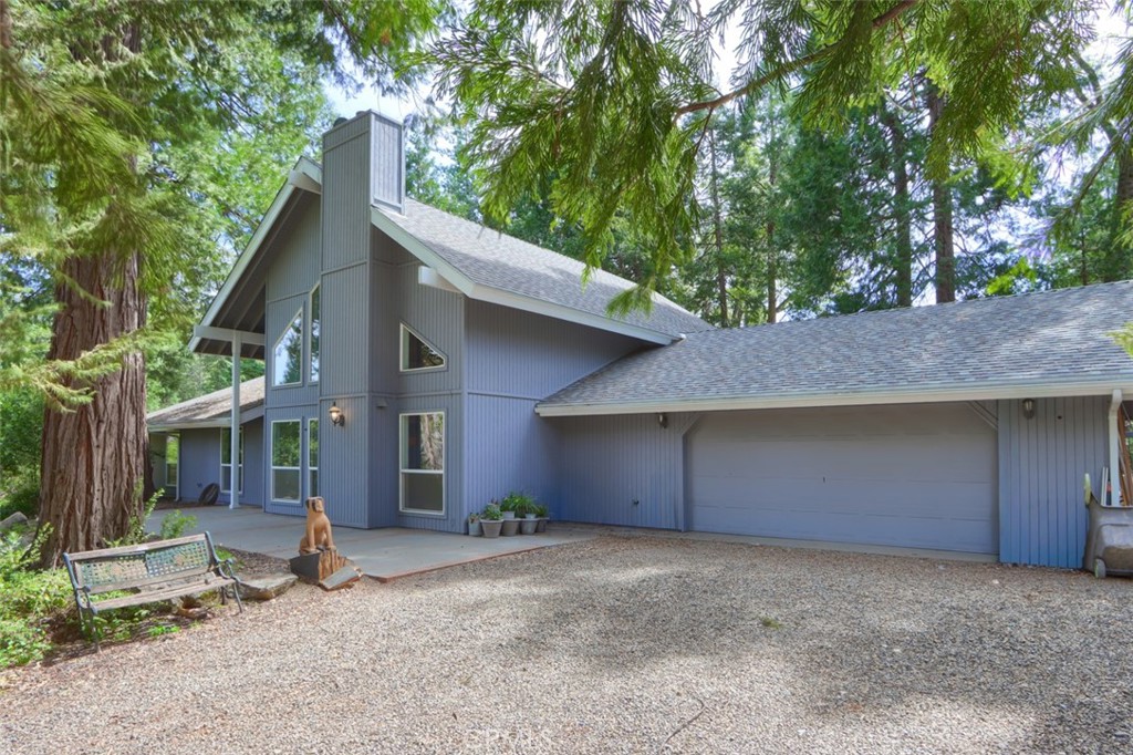 7174 Hites Cove Road Mariposa, CA 95338 - Photo 2 of 62 a house with a tree in front of it
