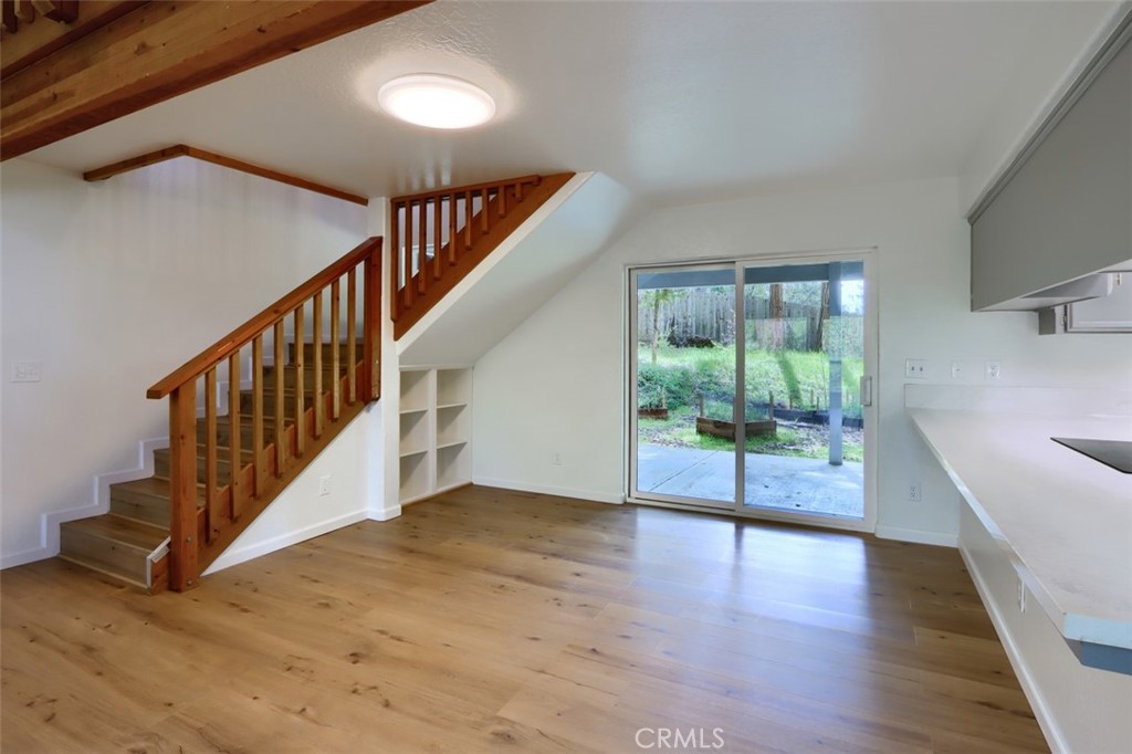 7174 Hites Cove Road Mariposa, CA 95338 - Photo 22 of 62 a view of staircase with white walls and windows