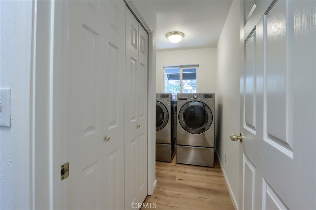 7174 Hites Cove Road Mariposa, CA 95338 - Photo 30 of 62 a view of a hallway with washer and dryer