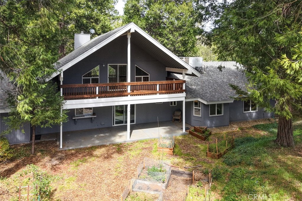 7174 Hites Cove Road Mariposa, CA 95338 - Photo 3 of 62 a view of house with yard and sitting area