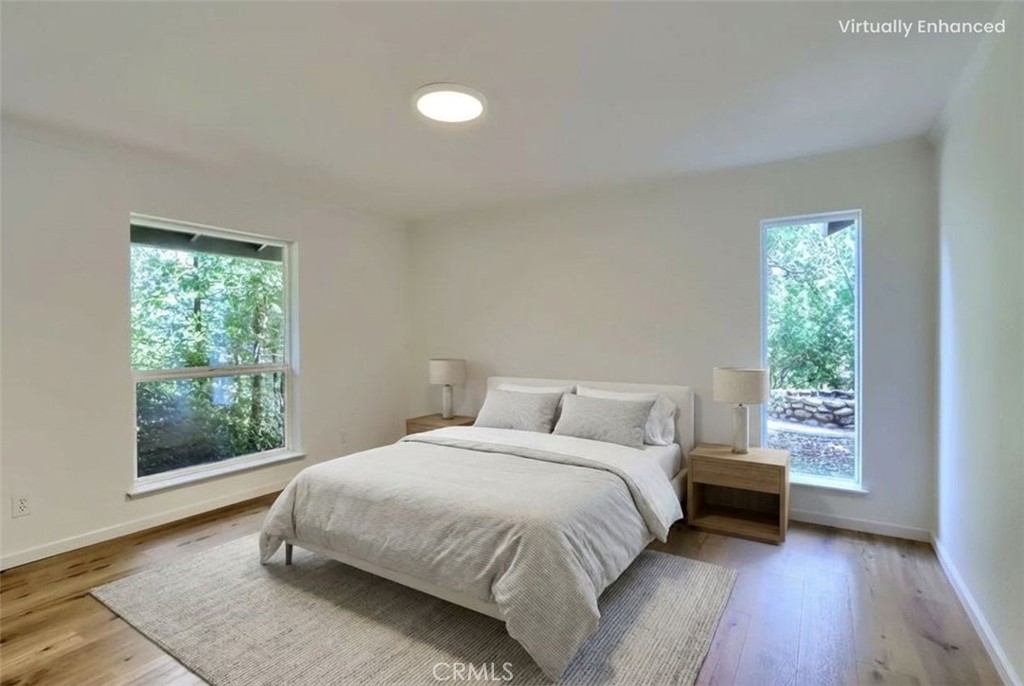 7174 Hites Cove Road Mariposa, CA 95338 - Photo 36 of 62 a bedroom with a bed and a window