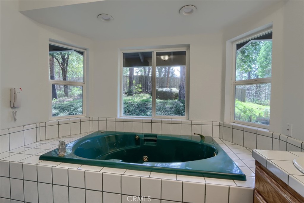7174 Hites Cove Road Mariposa, CA 95338 - Photo 44 of 62 a kitchen with a sink and a large window