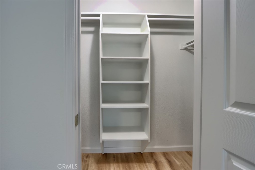 7174 Hites Cove Road Mariposa, CA 95338 - Photo 46 of 62 a view of walk in closet with empty racks