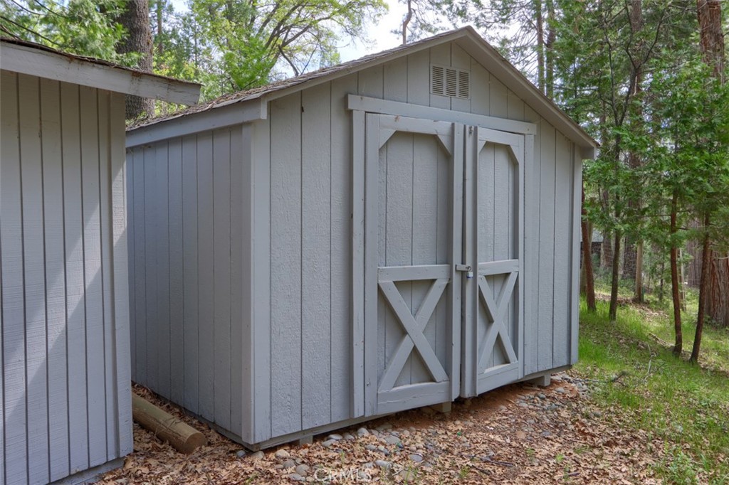 7174 Hites Cove Road Mariposa, CA 95338 - Photo 51 of 62 a wooden door in front of a house