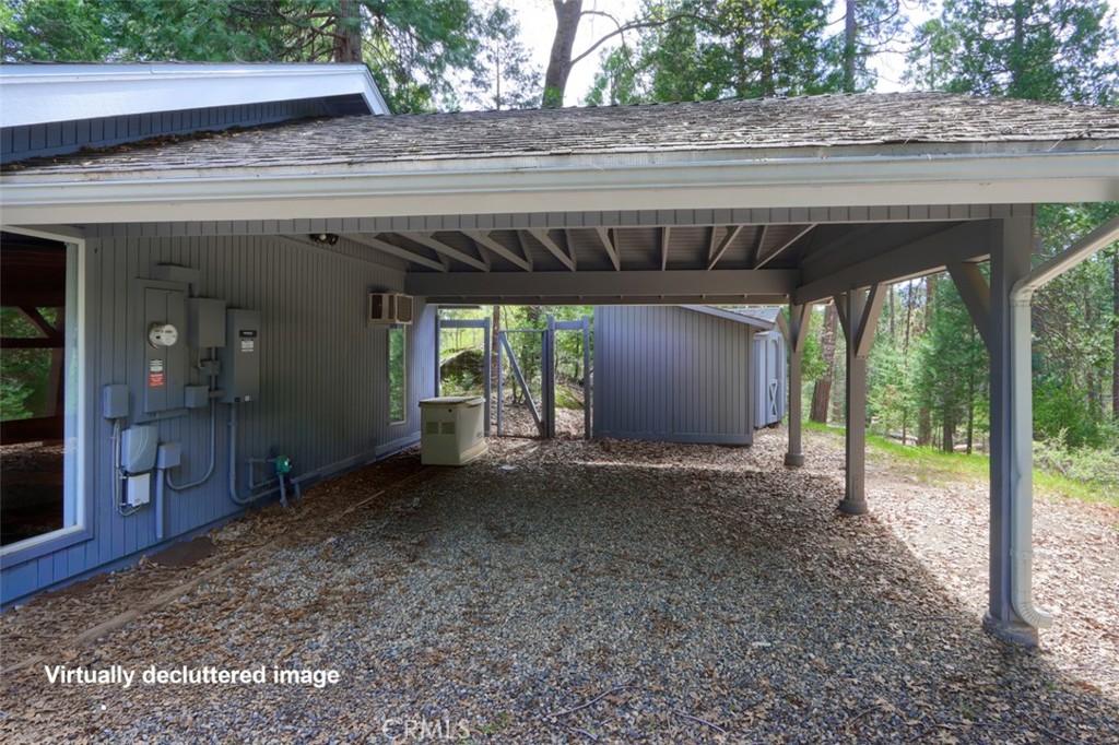 7174 Hites Cove Road Mariposa, CA 95338 - Photo 53 of 62 a view of backyard with large trees and plants