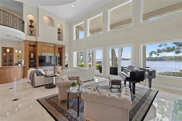 a en suite bathroom with a granite countertop sink and a mirror