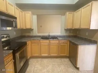 a bathroom with a bathtub and a sink