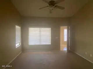 an empty room that has a window