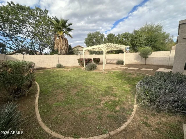 a view of a swimming pool with an outdoor space