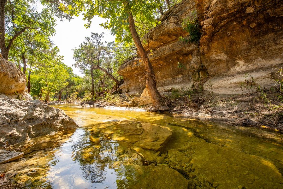 23642-23644 Nameless Road Leander, TX 78641 - Photo 1 of 37 a view of yard covered with snow