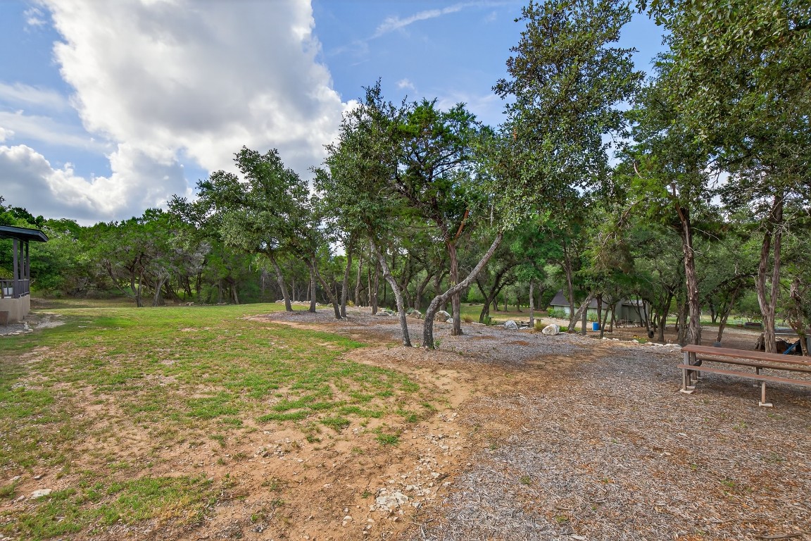 23642-23644 Nameless Road Leander, TX 78641 - Photo 13 of 37 a backyard of a house with lots of green space