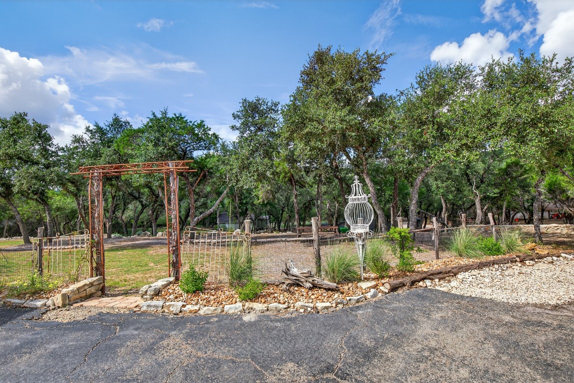 23642-23644 Nameless Road Leander, TX 78641 - Photo 15 of 37 a backyard of a house with a yard and outdoor seating