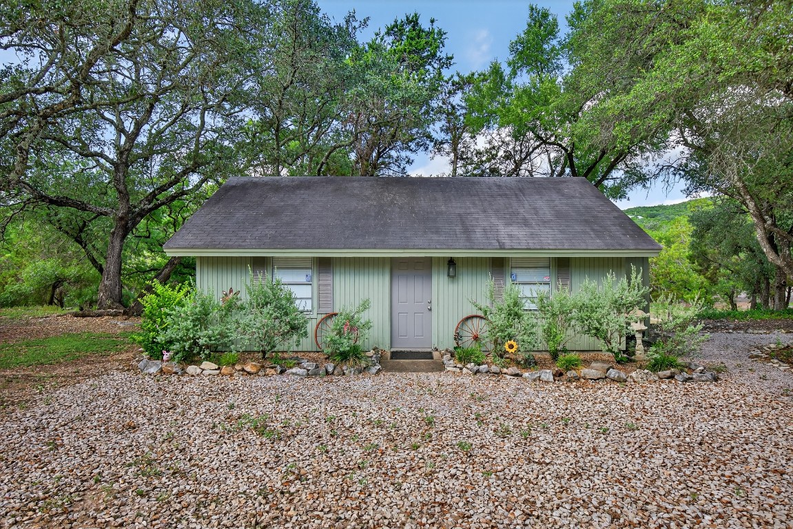 23642-23644 Nameless Road Leander, TX 78641 - Photo 19 of 37 a view of a house with a garden and plants