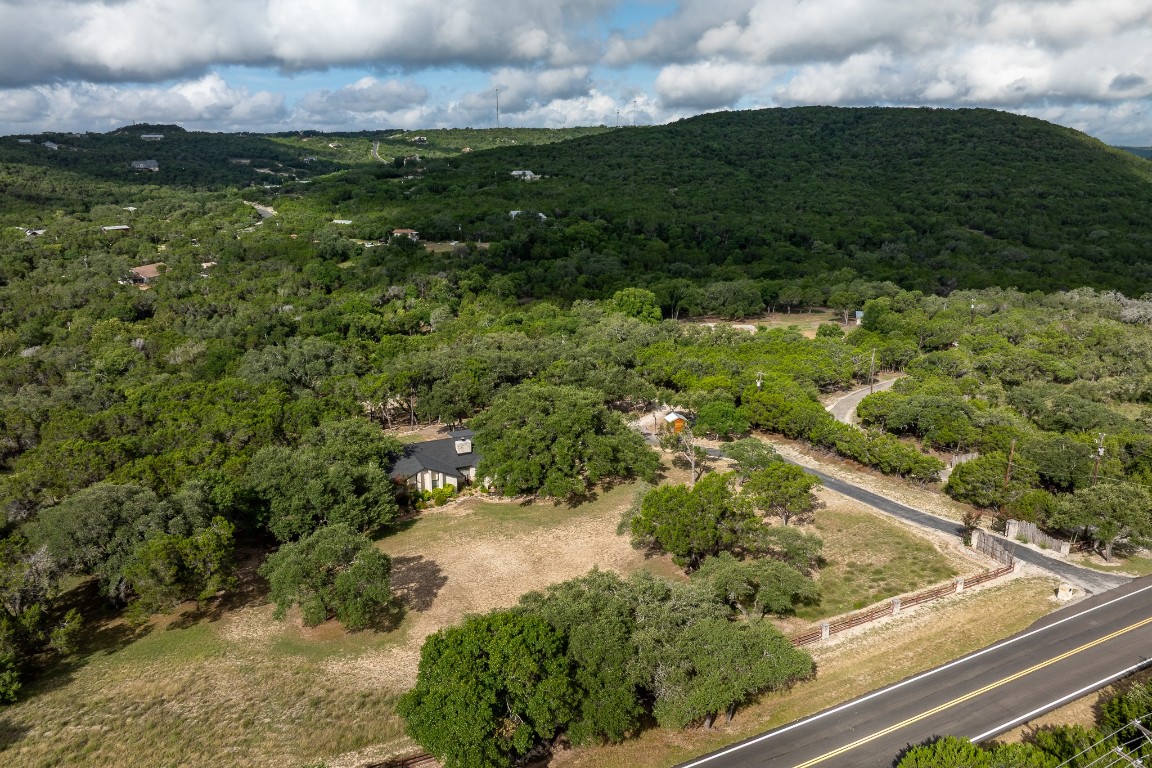 23642-23644 Nameless Road Leander, TX 78641 - Photo 20 of 37 a view of a yard with plants