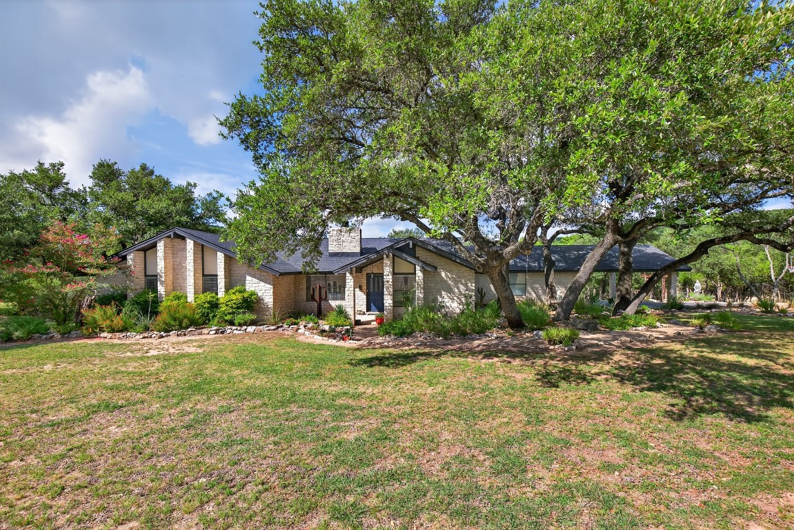 23642-23644 Nameless Road Leander, TX 78641 - Photo 22 of 37 a front view of a house with a yard