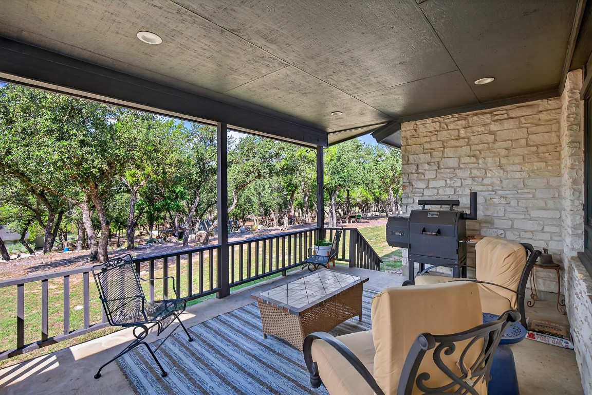 23642-23644 Nameless Road Leander, TX 78641 - Photo 36 of 37 a view of a patio with a table chairs and a patio