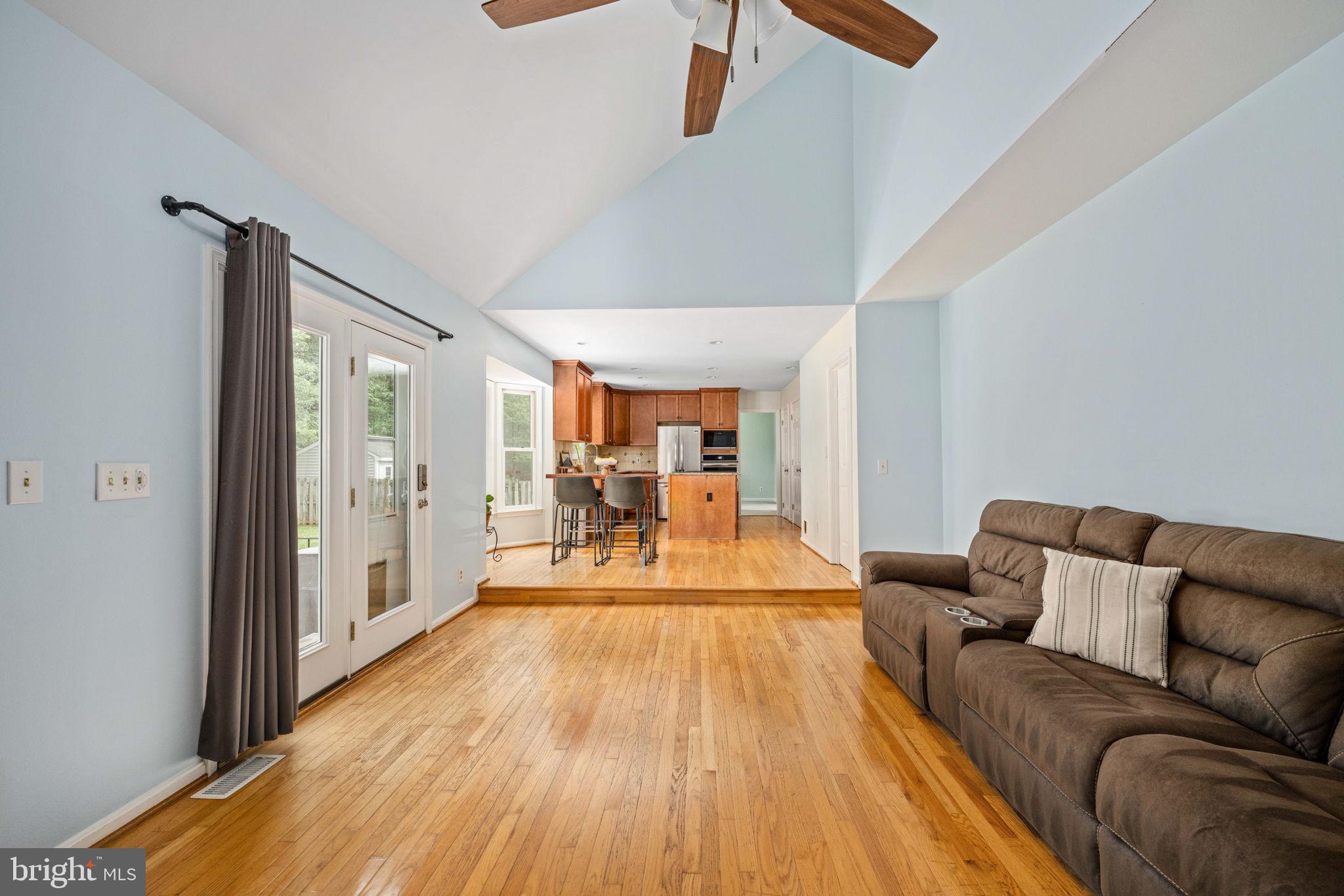 246 Choptank Road Stafford, VA 22556 - Photo 35 of 98 a living room with a couch and a table