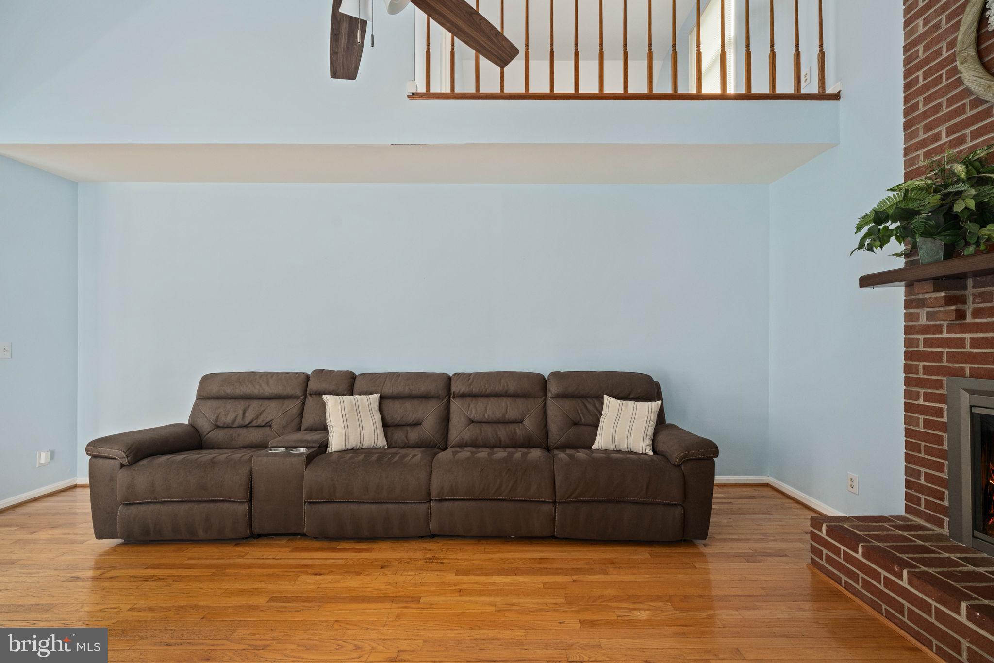 246 Choptank Road Stafford, VA 22556 - Photo 36 of 98 a living room with furniture and a potted plant