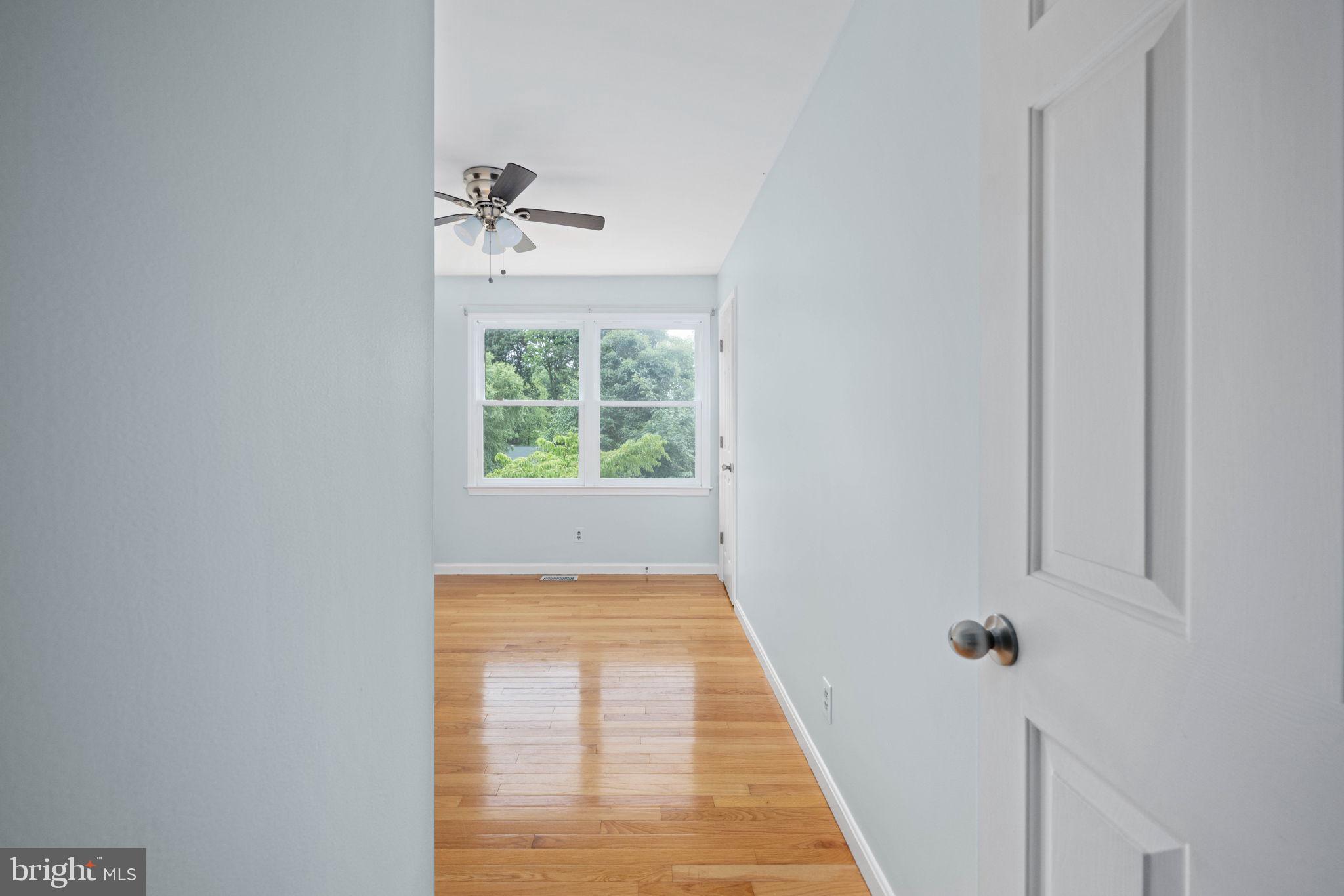 246 Choptank Road Stafford, VA 22556 - Photo 40 of 98 a view of a hallway with a window