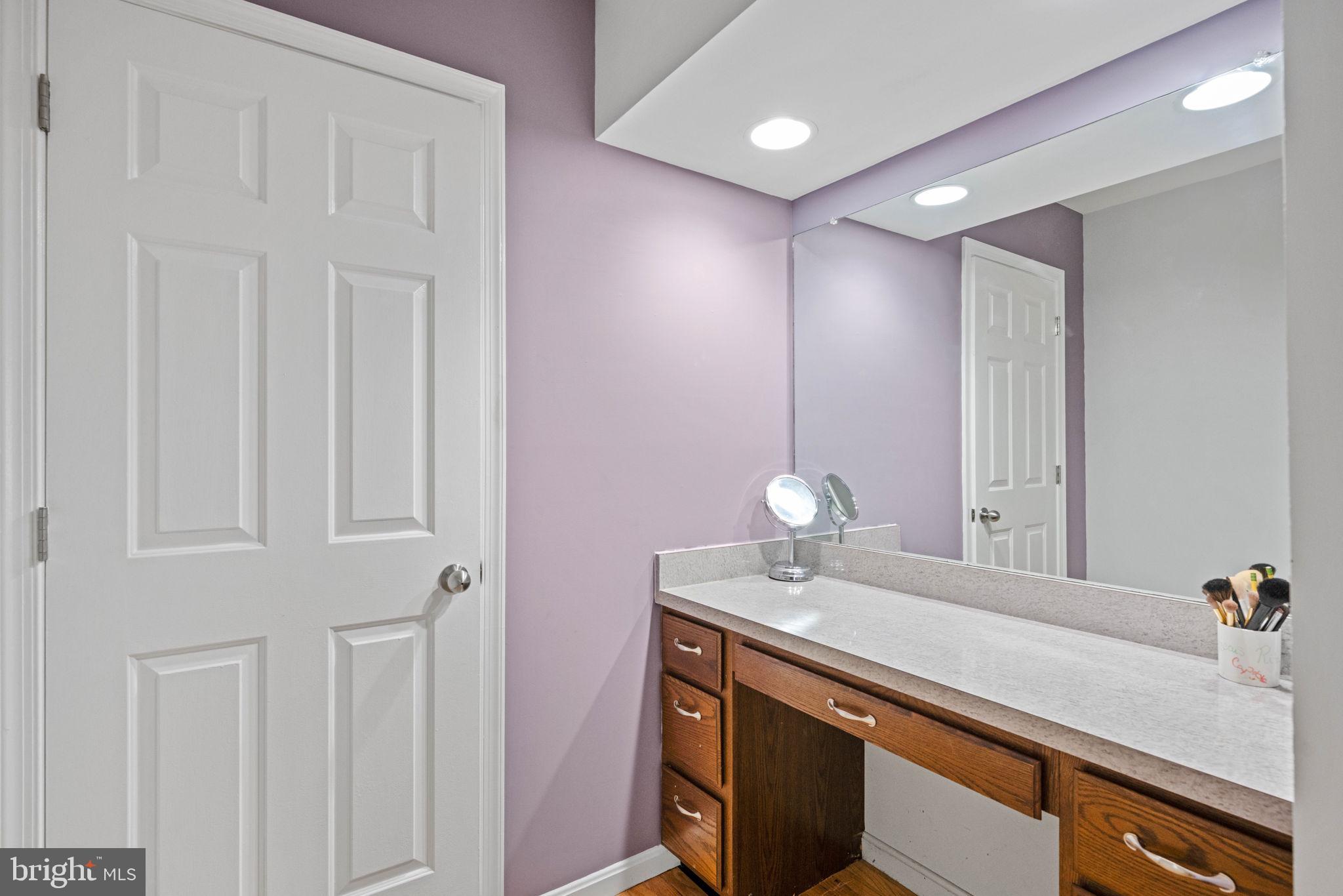 246 Choptank Road Stafford, VA 22556 - Photo 52 of 98 a bathroom with a sink and a mirror