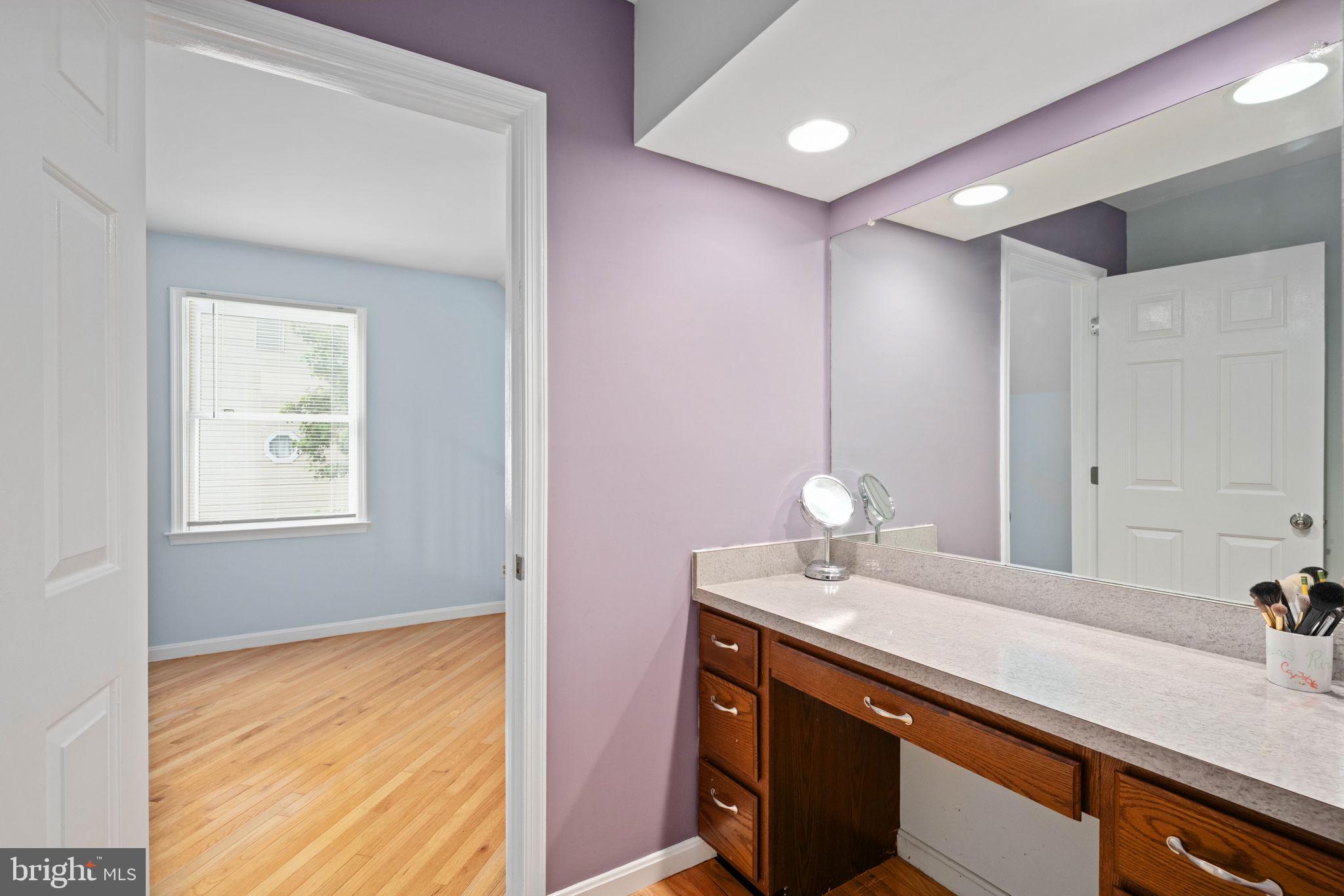 246 Choptank Road Stafford, VA 22556 - Photo 53 of 98 a bathroom with a sink and a mirror