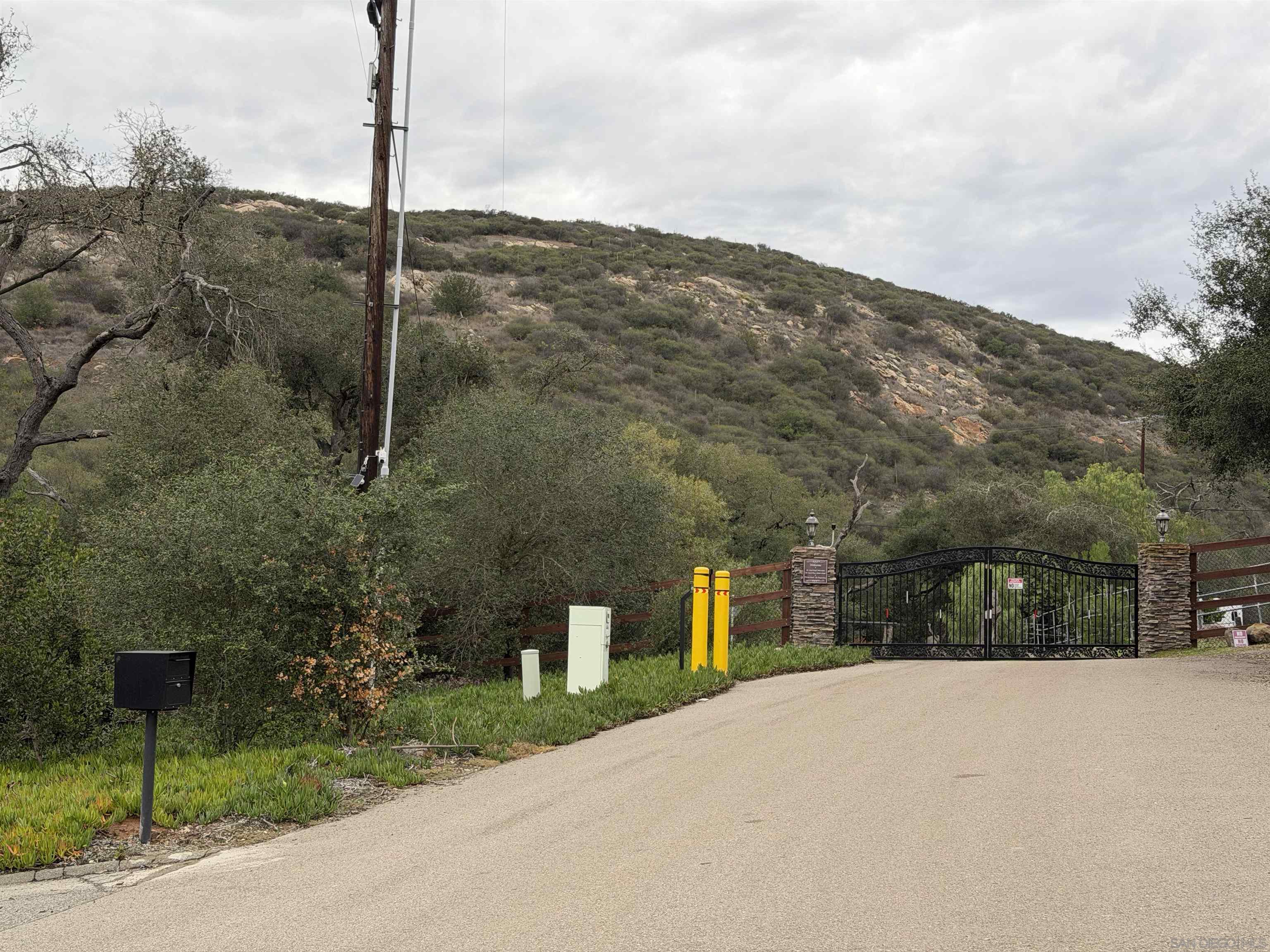 0 Mt Israel Road Escondido, CA 92029 - Photo 11 of 18 a view of a road with a building in the background