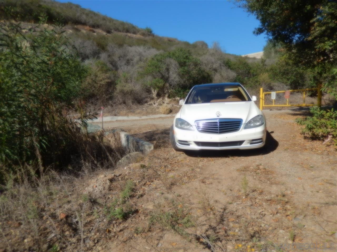 0 Mt Israel Road Escondido, CA 92029 - Photo 5 of 18 a backyard of a house with a yard and trampoline