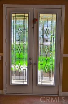2394 Old Heritage Road Riverside, CA 92503 - Photo 12 of 45 a view of two window in a room