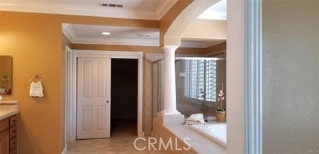 2394 Old Heritage Road Riverside, CA 92503 - Photo 26 of 45 a view of a hallway with bathroom and glass door