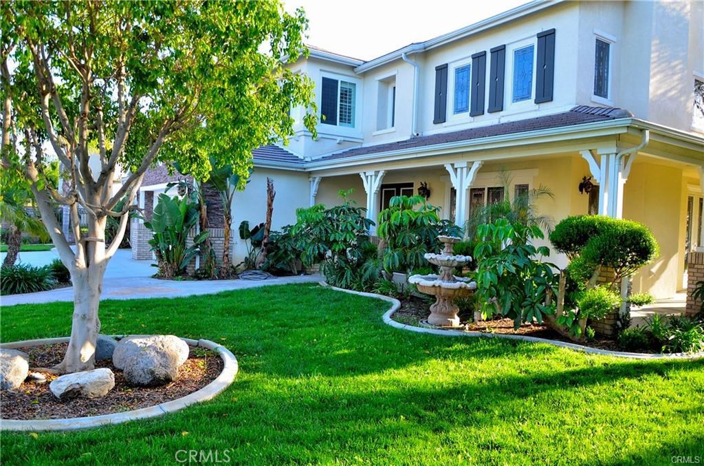2394 Old Heritage Road Riverside, CA 92503 - Photo 3 of 45 a front view of a house with garden