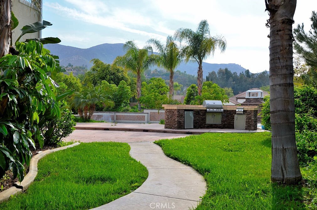 2394 Old Heritage Road Riverside, CA 92503 - Photo 37 of 45 a view of house with swimming pool and garden