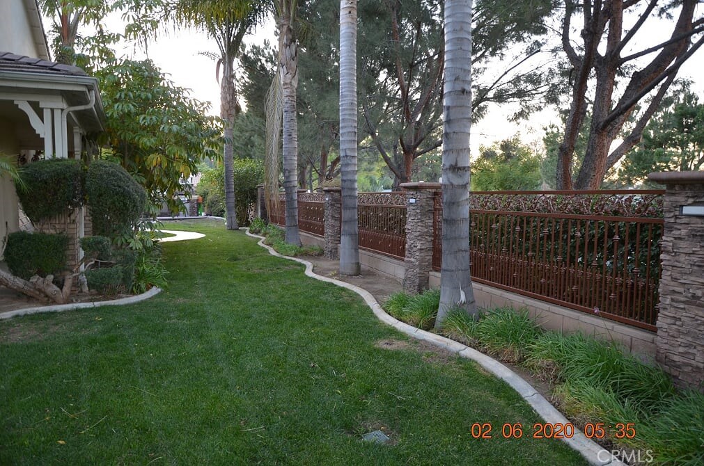 2394 Old Heritage Road Riverside, CA 92503 - Photo 7 of 45 a view of a garden with a tree