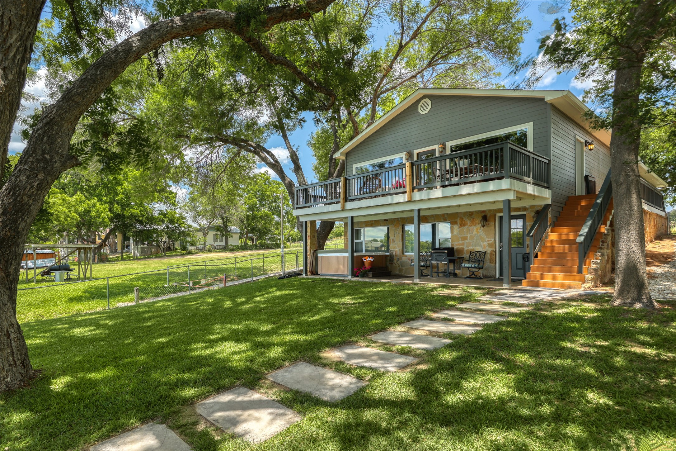 525 Ellen Williams Loop Kingsland, TX 78639 - Photo 16 of 36 a view of a house with a yard