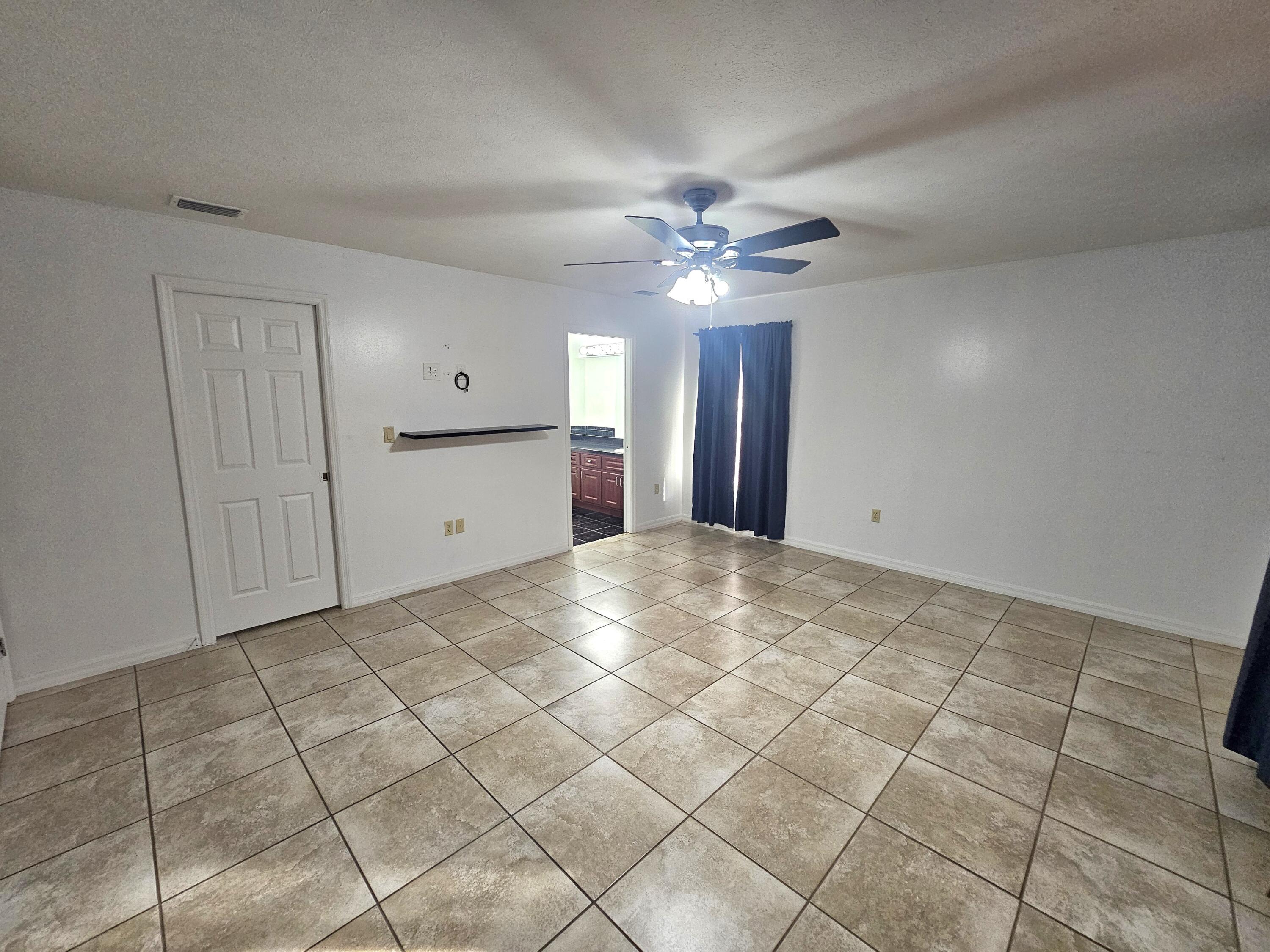 1514 Summer Road Lake Placid, FL 33852 - Photo 21 of 52 a view of an empty room with a window