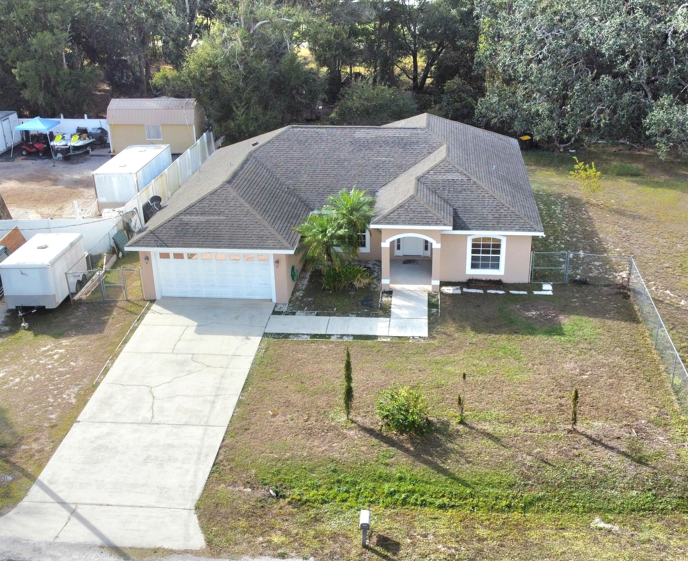 1514 Summer Road Lake Placid, FL 33852 - Photo 3 of 52 a view of a house with garden