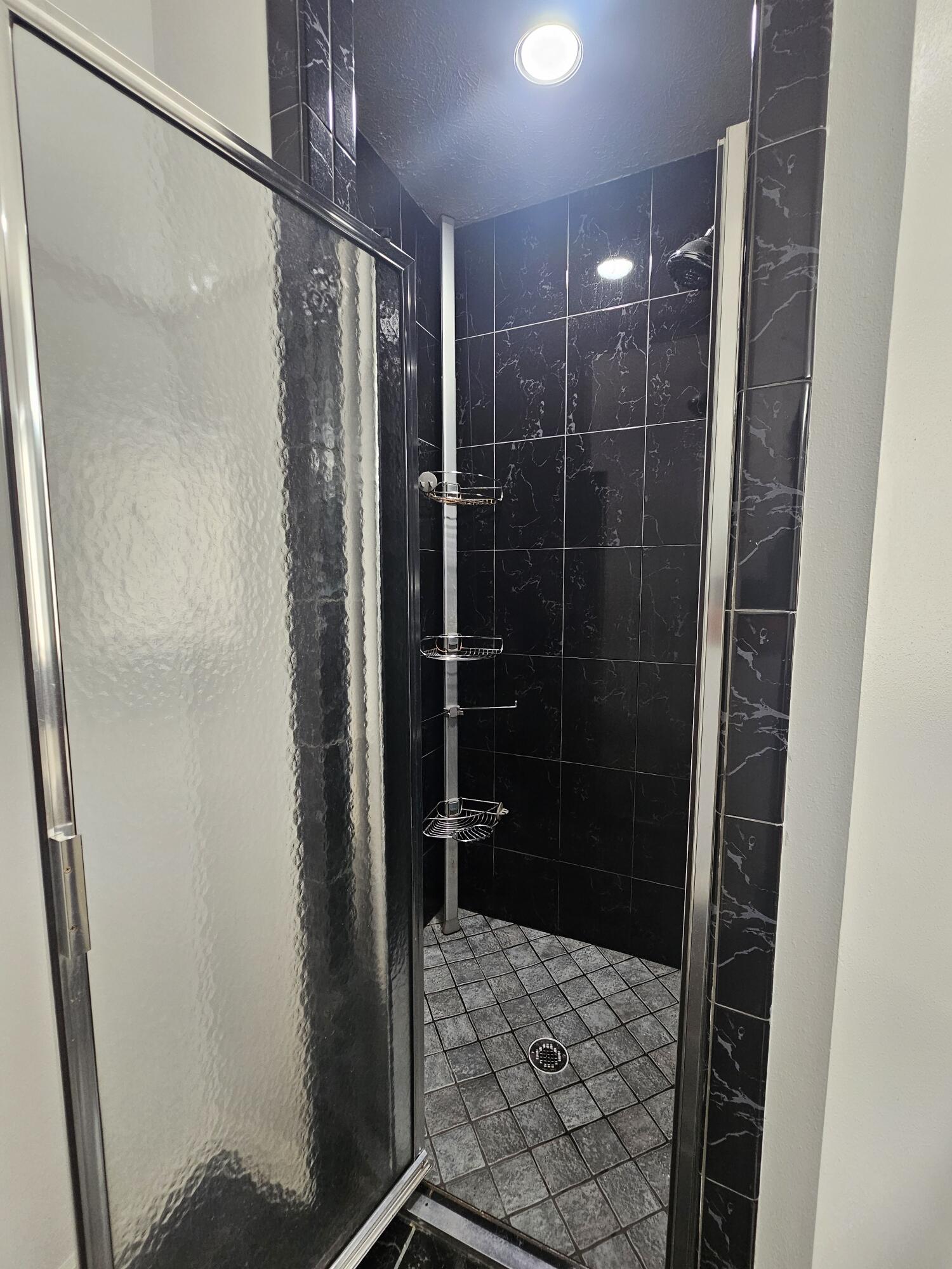 1514 Summer Road Lake Placid, FL 33852 - Photo 31 of 52 a bathroom with a shower and a sink