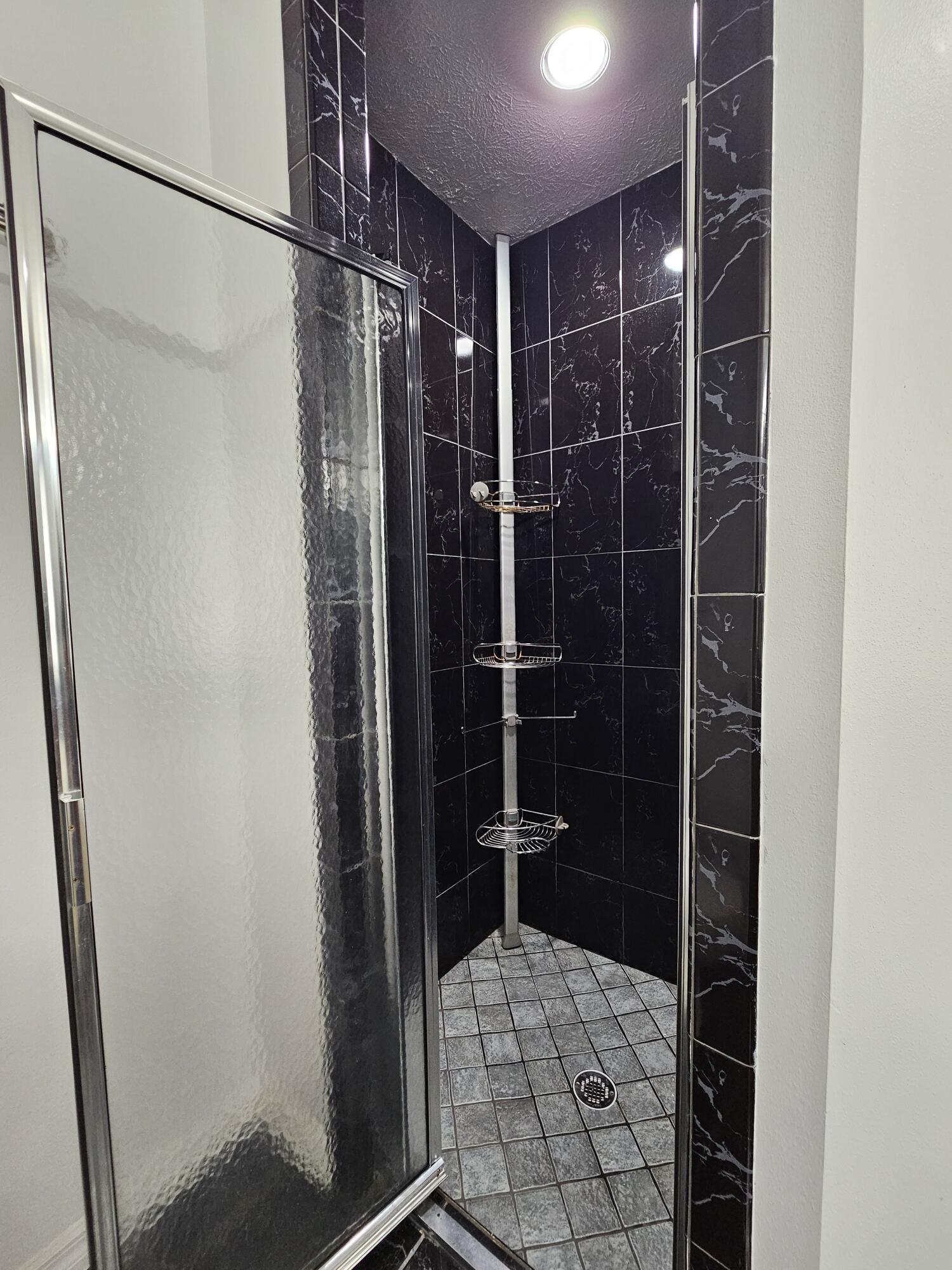 1514 Summer Road Lake Placid, FL 33852 - Photo 32 of 52 a bathroom with a shower and a toilet