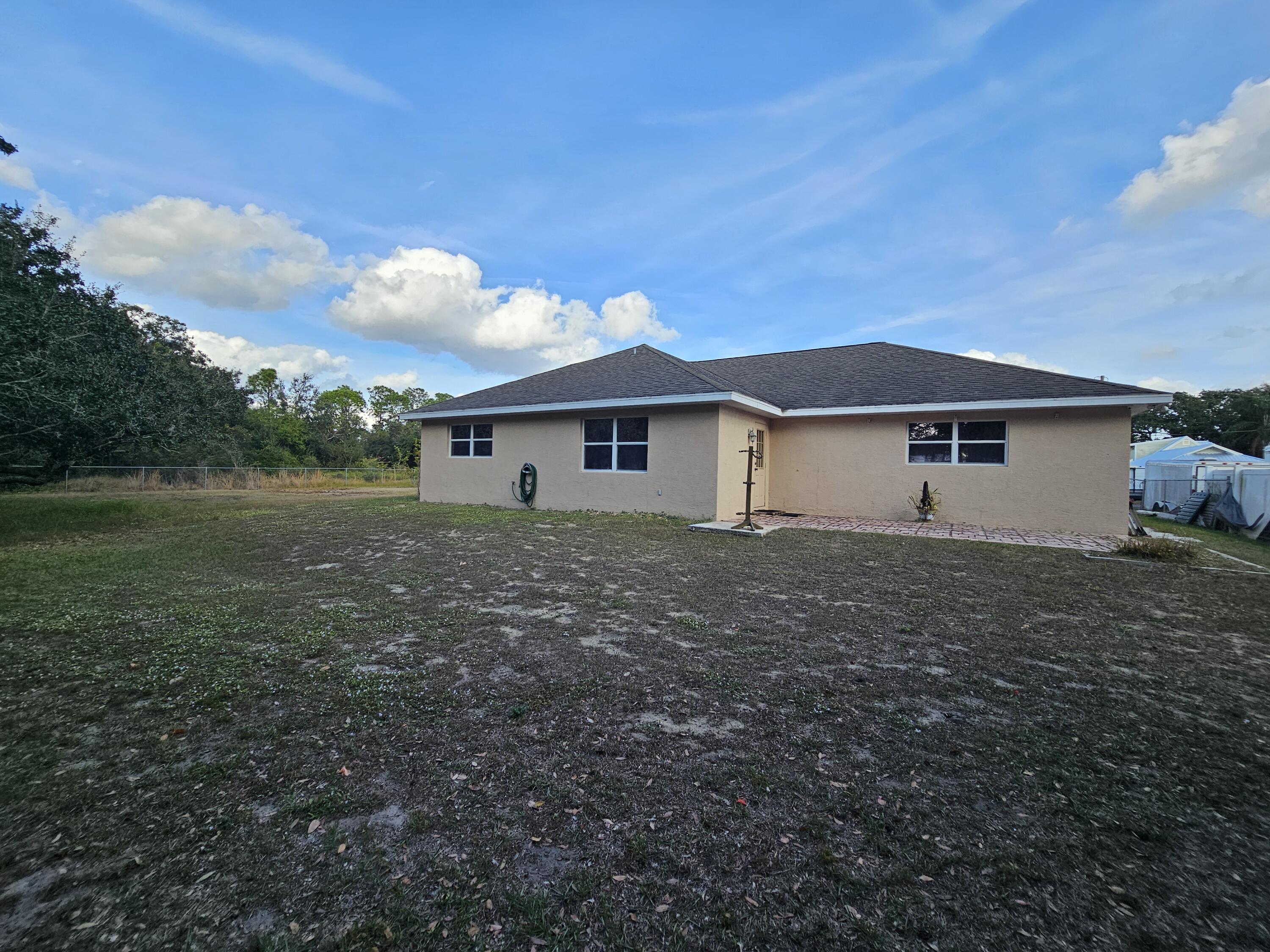 1514 Summer Road Lake Placid, FL 33852 - Photo 48 of 52 a view of a house with a yard