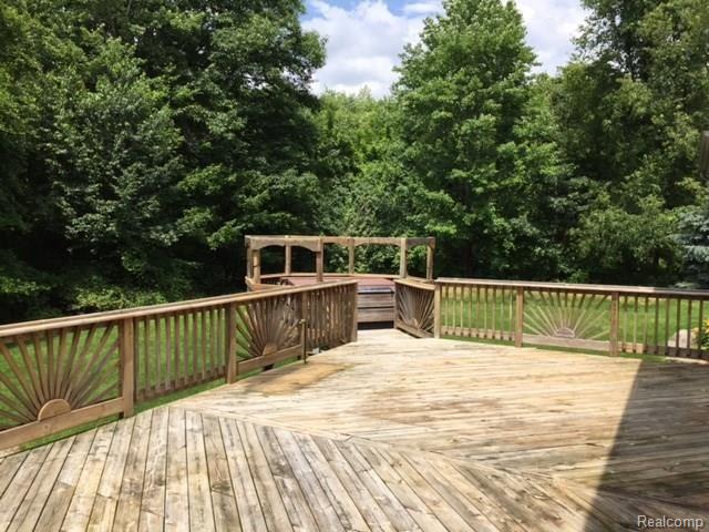 4833 Clements Circle Howell, MI 48855 - Photo 21 of 27 deck and view of yard