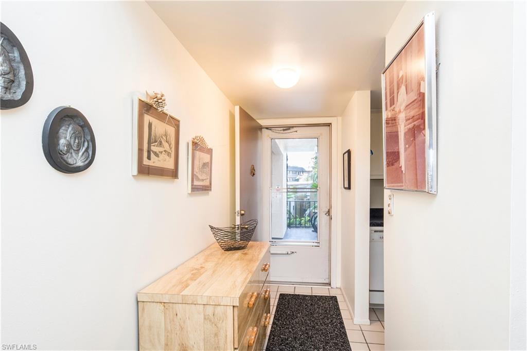 5451 Rattlesnake Hammock Road, Unit D108 Naples, FL 34113 - Photo 4 of 17 a very nice looking room with a large window