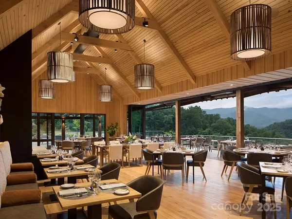 a outdoor space with lots of tables and chairs