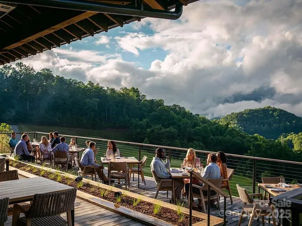 a view of roof deck with furniture