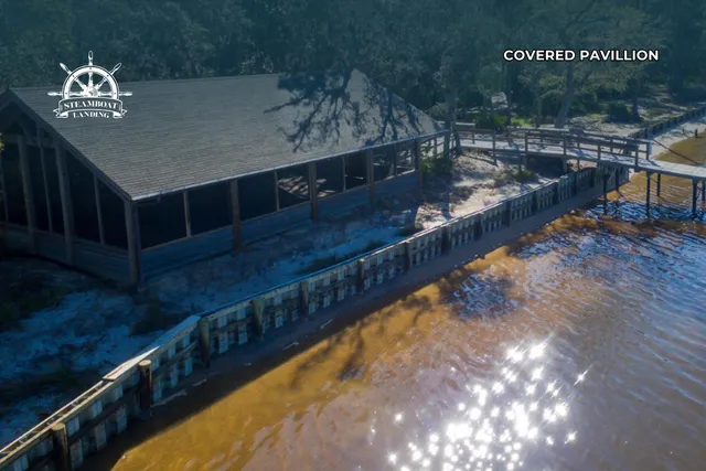 a view of swimming pool with seating space