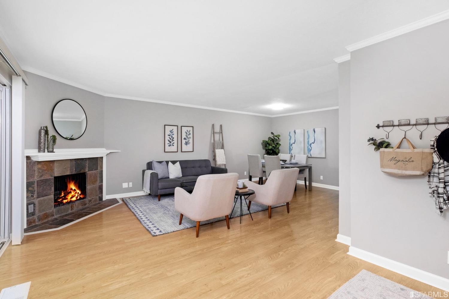 413 Woodminster Drive Moraga, CA 94556 - Photo 6 of 33 a living room with furniture and a fireplace