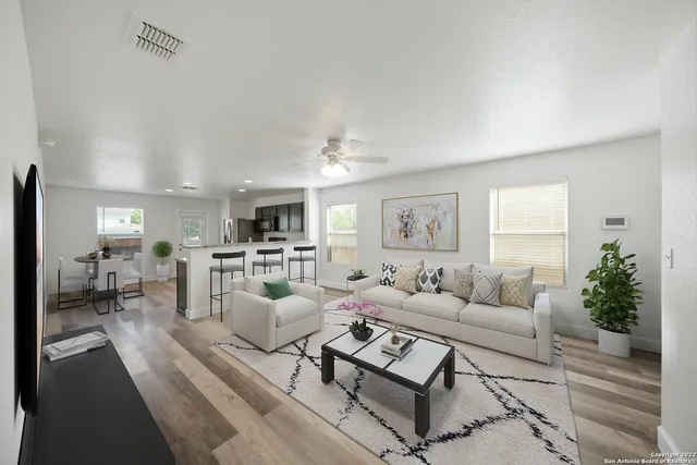 a living room with furniture and a couch