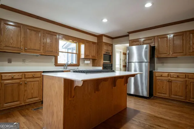 a utility room with sink dryer and washer