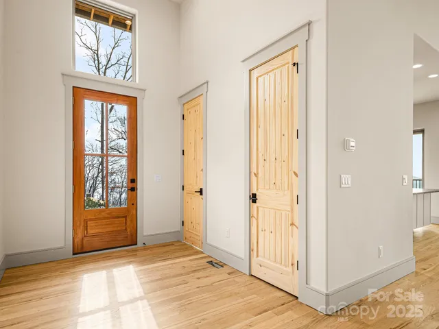 a white tub sitting next to a shower